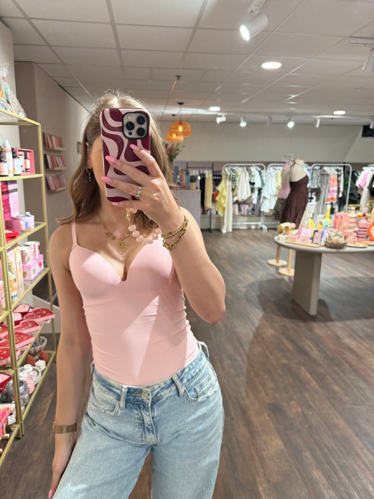 Roze shapewear body met voorgevormde cups