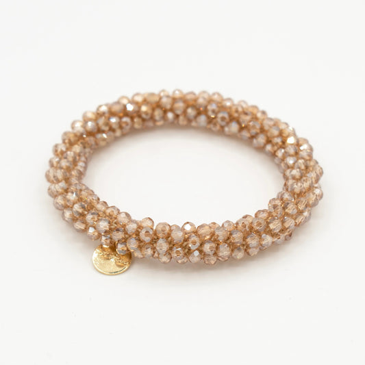 Stiekie Gold kralen haarelastiek die ook als armband gedragen kan worden