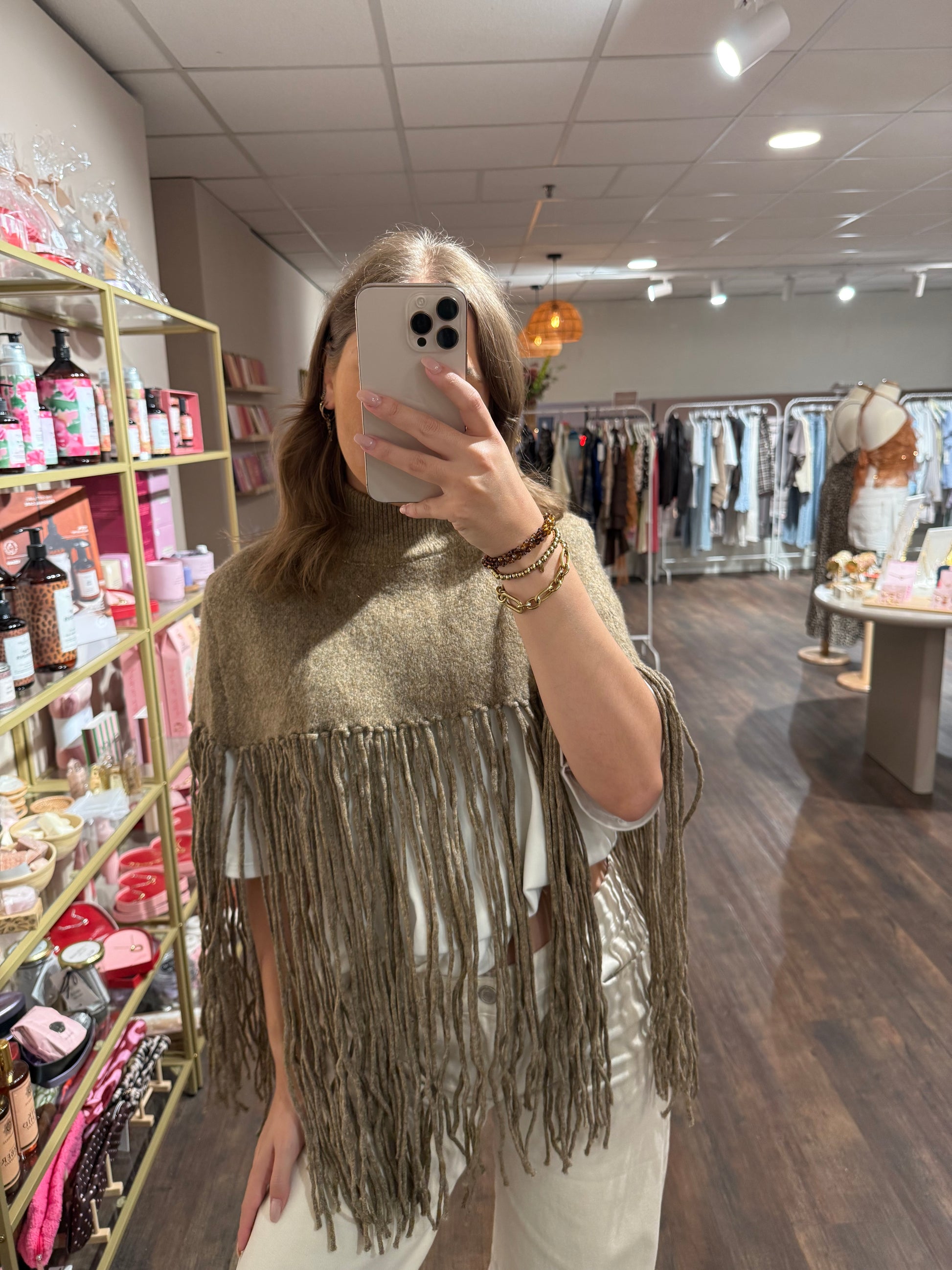Taupe poncho trui met franjes