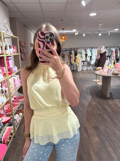 Halter top in populaire butter yellow kleur.