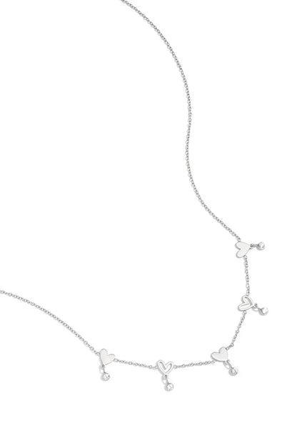 Wisselende hartjes en hangende steentjes ketting zilver