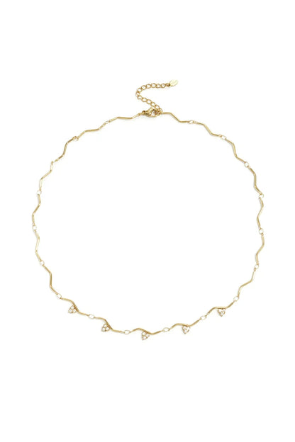 Zigzag patroon en steentjes ketting goud