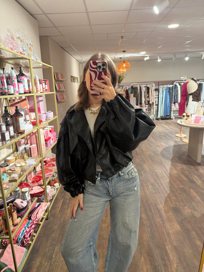 Dames jas met trenchcoat-model en elastische onderkant.  