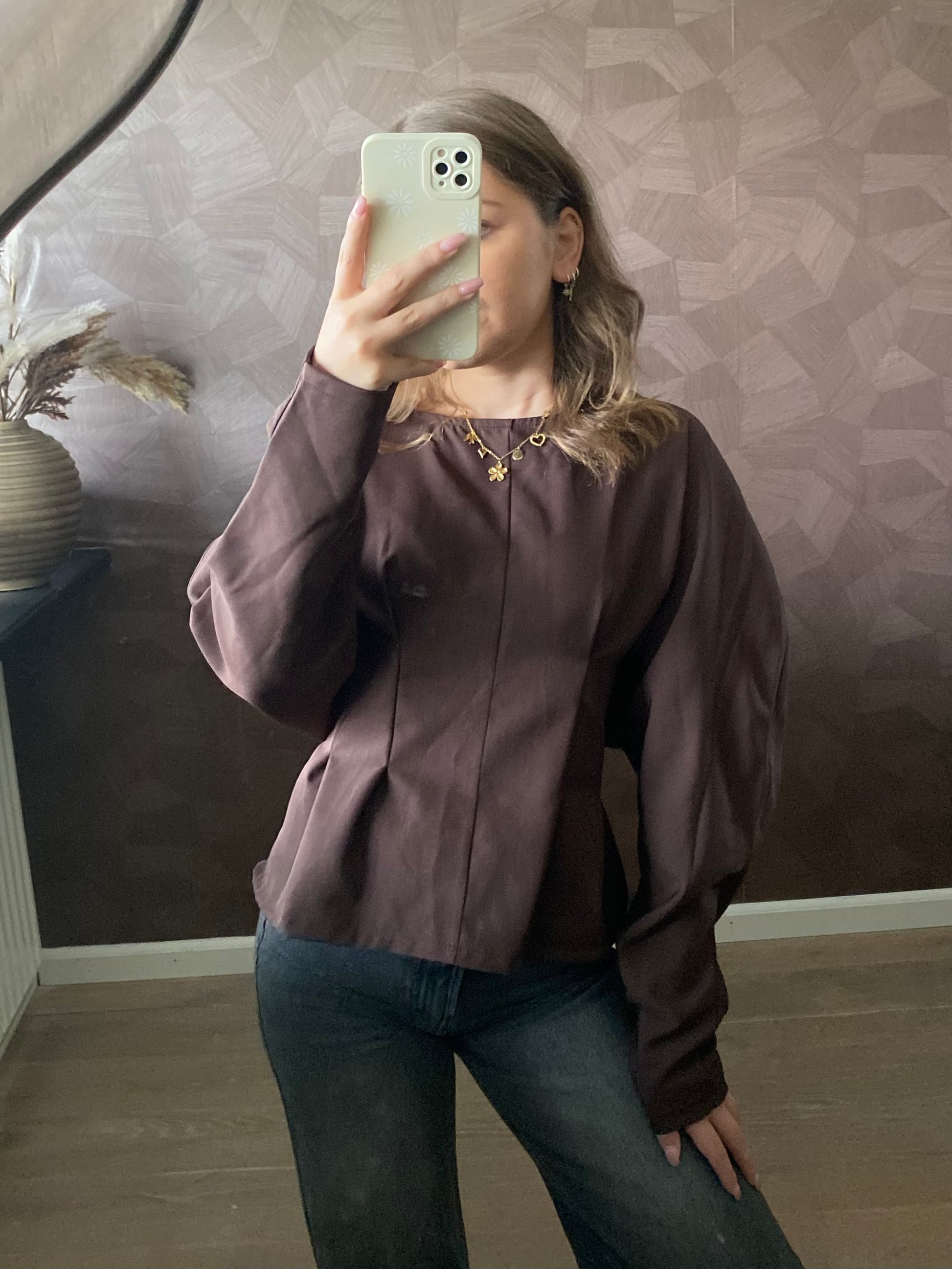 Chique bruin top met strakke fit en elegante knoop