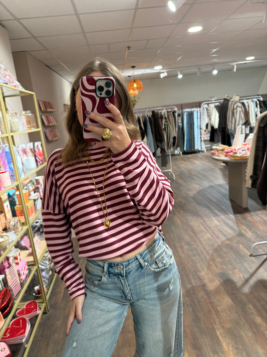 Roze bordeaux gestreepte longsleeve voor dames. 