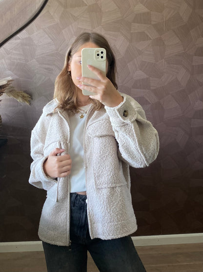 Beige winterjas van teddy stof met ritssluiting